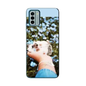Чехлы с изображением разных животных для Nokia G22 (Ежик на руках)