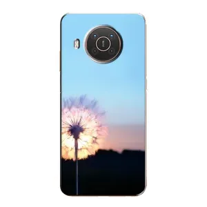 Силиконовый Чехол с одуванчиками на Nokia X10 (Закат с одуванчиком)