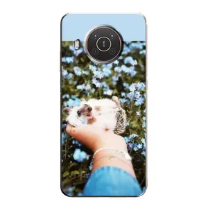 Чехлы с изображением разных животных для Nokia X20 (Ежик на руках)